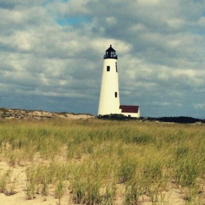 lighthouse on sand dunes